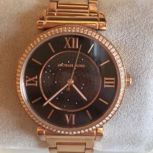 Woman’s Rose Gold Wrist Watch With Black Face